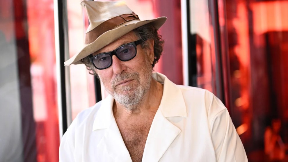 Julian Schnabel poses for a photographer at the 82nd Venice International Film Festival on September 3, 2025 in Venice, Italy. (Kate Green/Getty Images)
