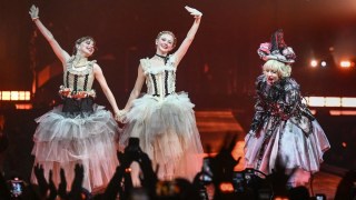 Lady Gaga Taps ‘Wednesday’ Stars Emma Myers & Evie Templeton for ‘Mayhem Ball’ Performance | Video