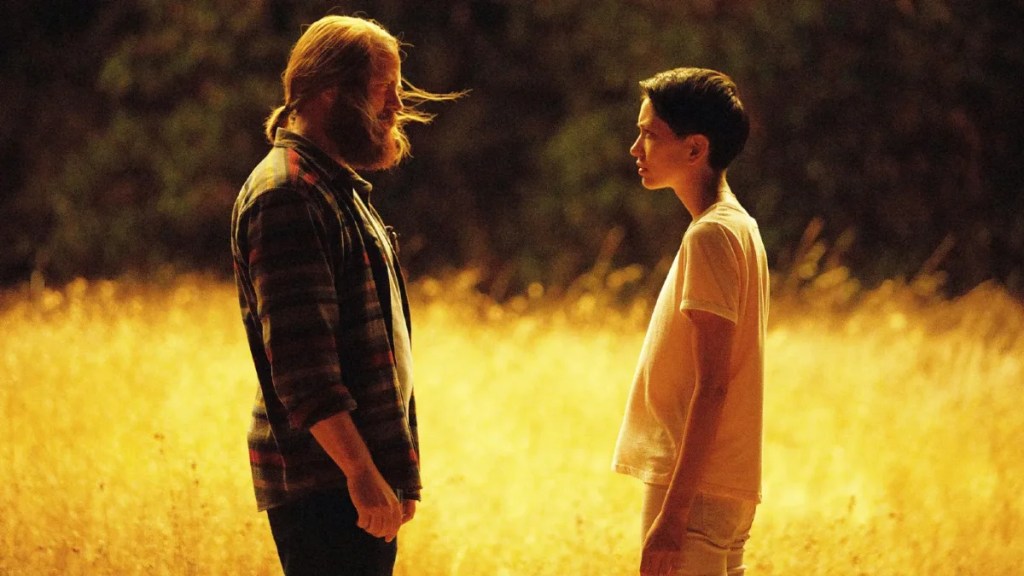 Nick Offerman and Sonoya Mizuno stand in front of each other in "Devs."