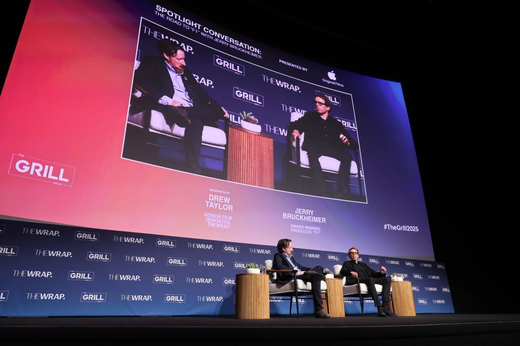 Drew Taylor, Senior Film Reporter, TheWrap and Jerry Bruckheimer, Award-Winning Producer "F1" speaks onstage  at TheGrill 2025 during the Spotlight Conversation: The Road to âF1â with Jerry Bruckheimer