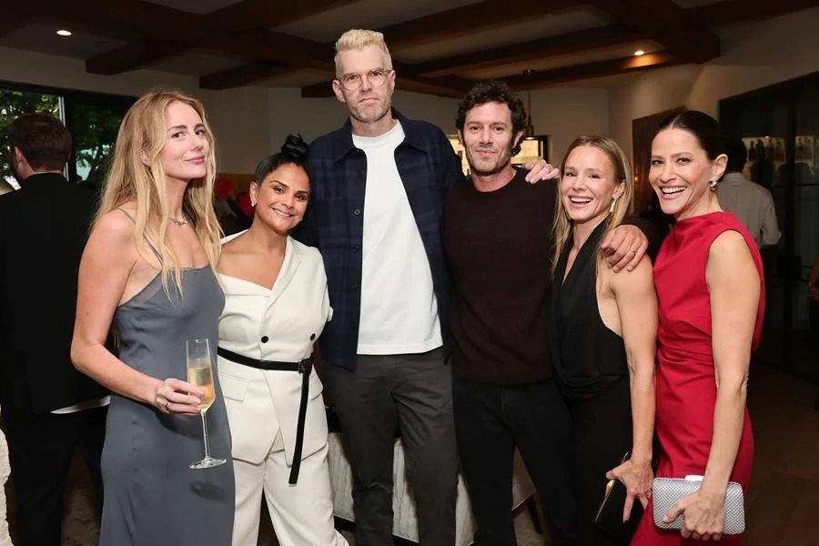 (Left to Right) Justine Lupe, Chief Content Officer of Netflix Bela Bajaria, Timothy Simons, Adam Brody, Kristen Bell and Jackie Tohn attend Netflix's 2025 Emmy's Toast at a private residence in Studio City. (Emma McIntyre/Getty Images)